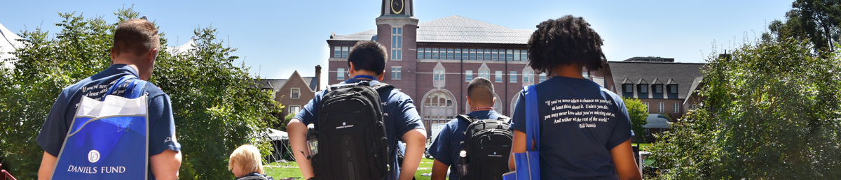 Scholars walking on campus