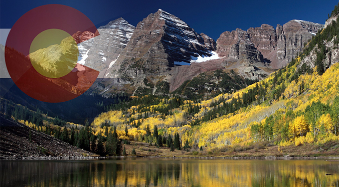 Colorado flag and mountains